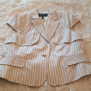 A woman's  BCBG skirt suit pin stripe